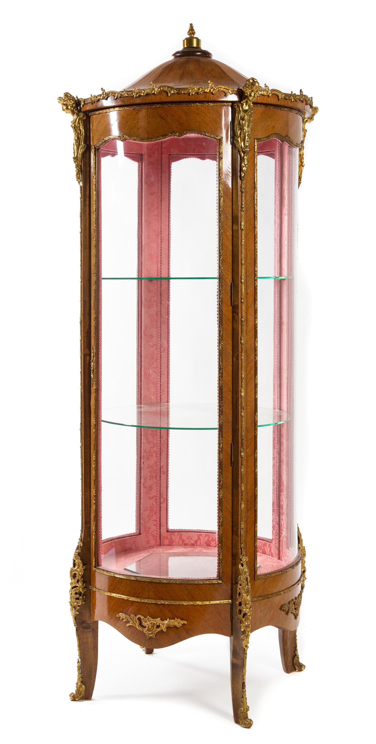 A Louis XV Style Gilt Metal Mounted Fruitwood Vitrine Height 81 x diameter 34 1/2 inches. — 20TH CENTURY