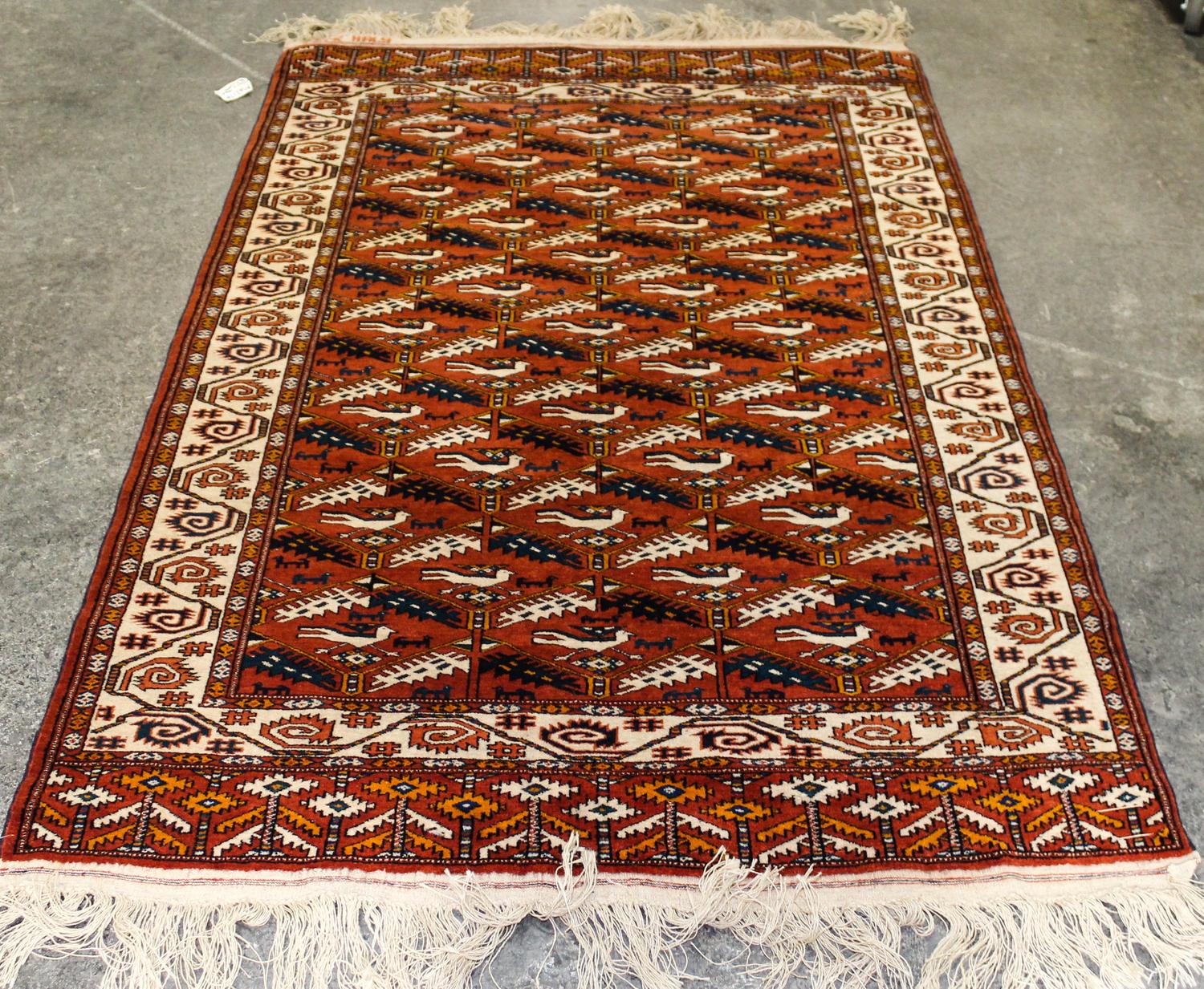Three Turkoman Wool Rugs Dimensions of largest 7 feet 1 inch x 4 feet 5 inches.