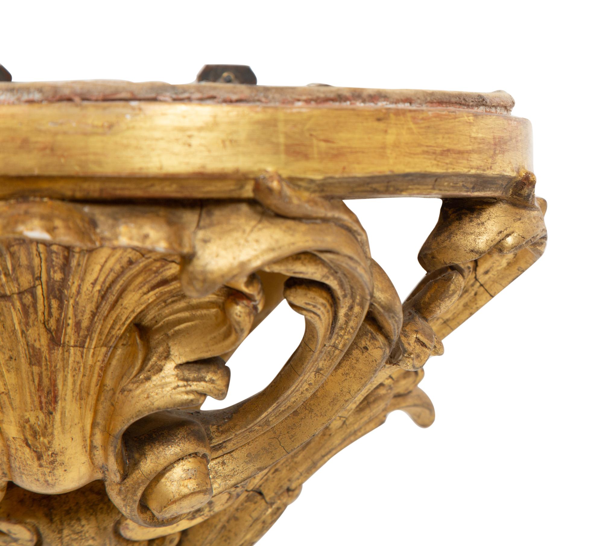 A Pair of Louis XV Style Giltwood Wall Brackets