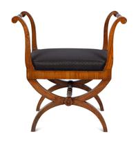 A Continental Walnut Curule Bench — 19TH CENTURY