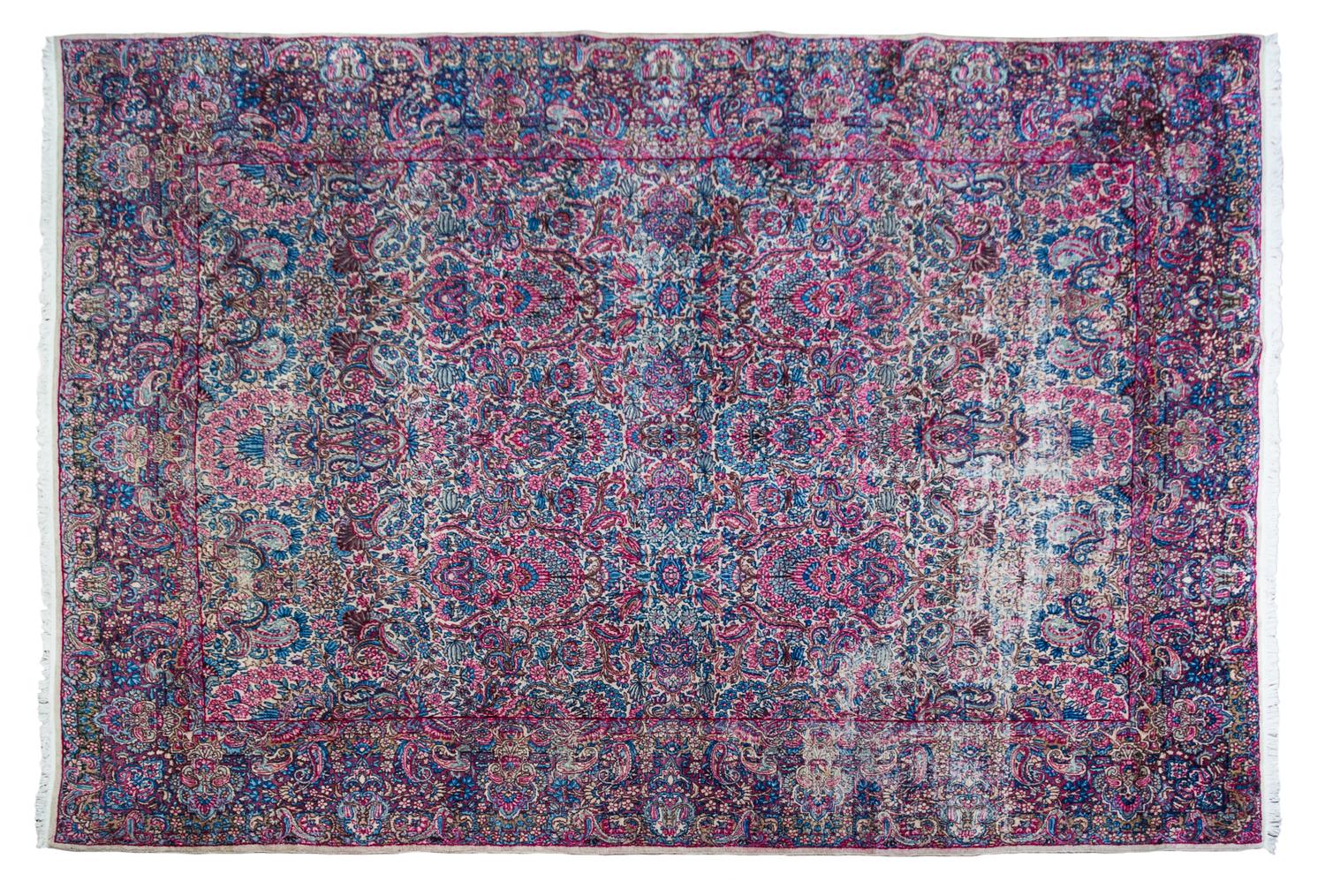 A Kirman Wool Rug 11 feet 9 inches x 8 feet 6 inches. — EARLY TO MID-20TH CENTURY