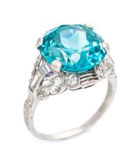 An Art Deco Platinum, Blue Zircon, White Sapphire and Diamond Ring, 4.40 dwts.