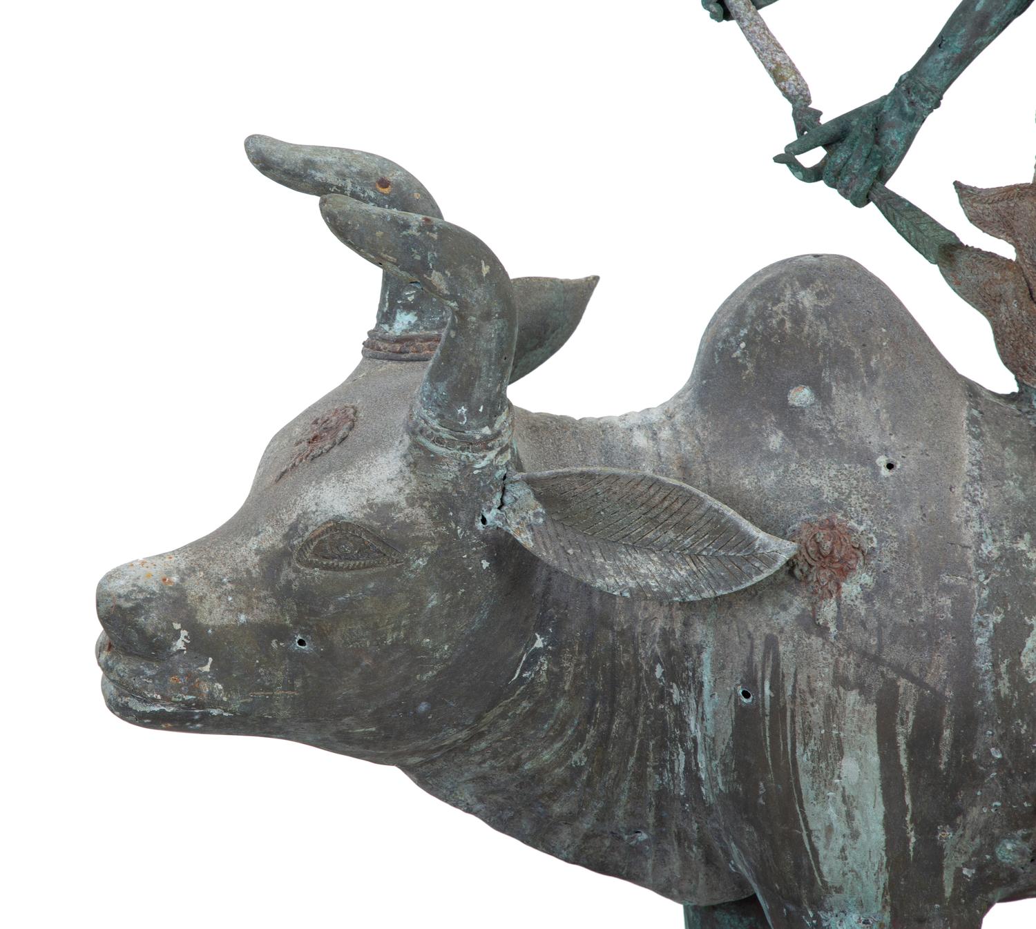 A Tibetan Bronze Durga on Bull — 20TH CENTURY