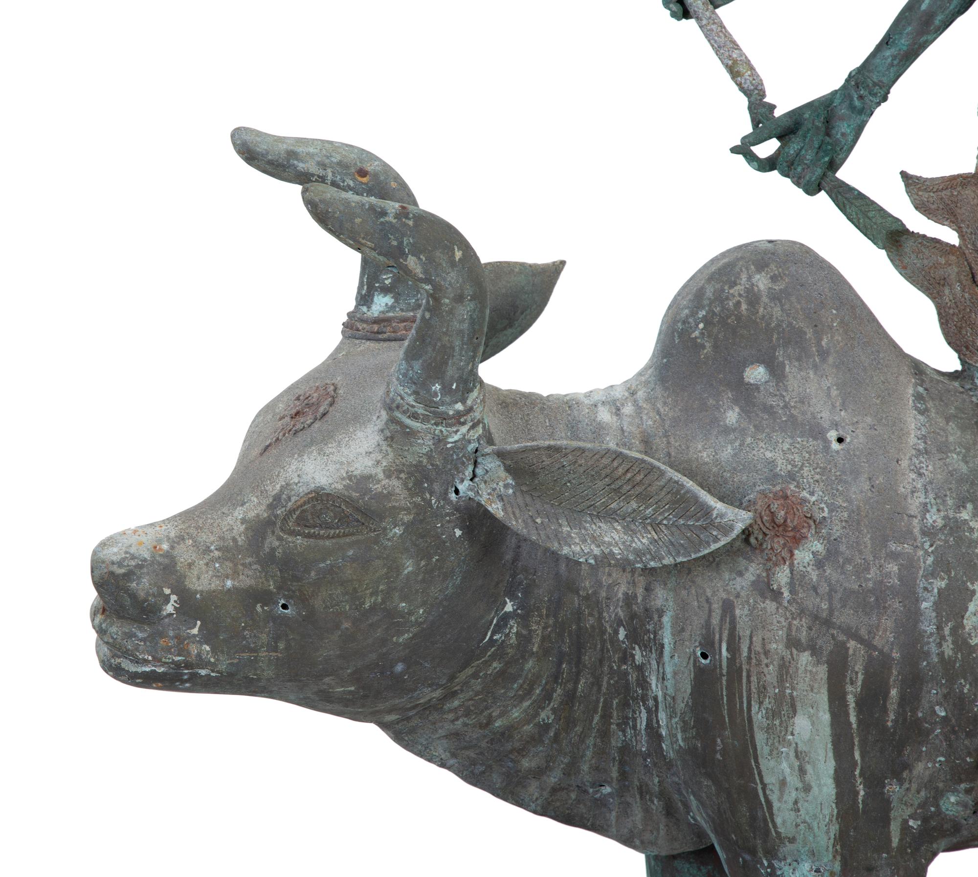 A Tibetan Bronze Durga on Bull — 20TH CENTURY