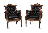 A Pair of American Victorian Gilt and Black Lacquered Burlwood Armchairs, Height 41 1/2 inches.