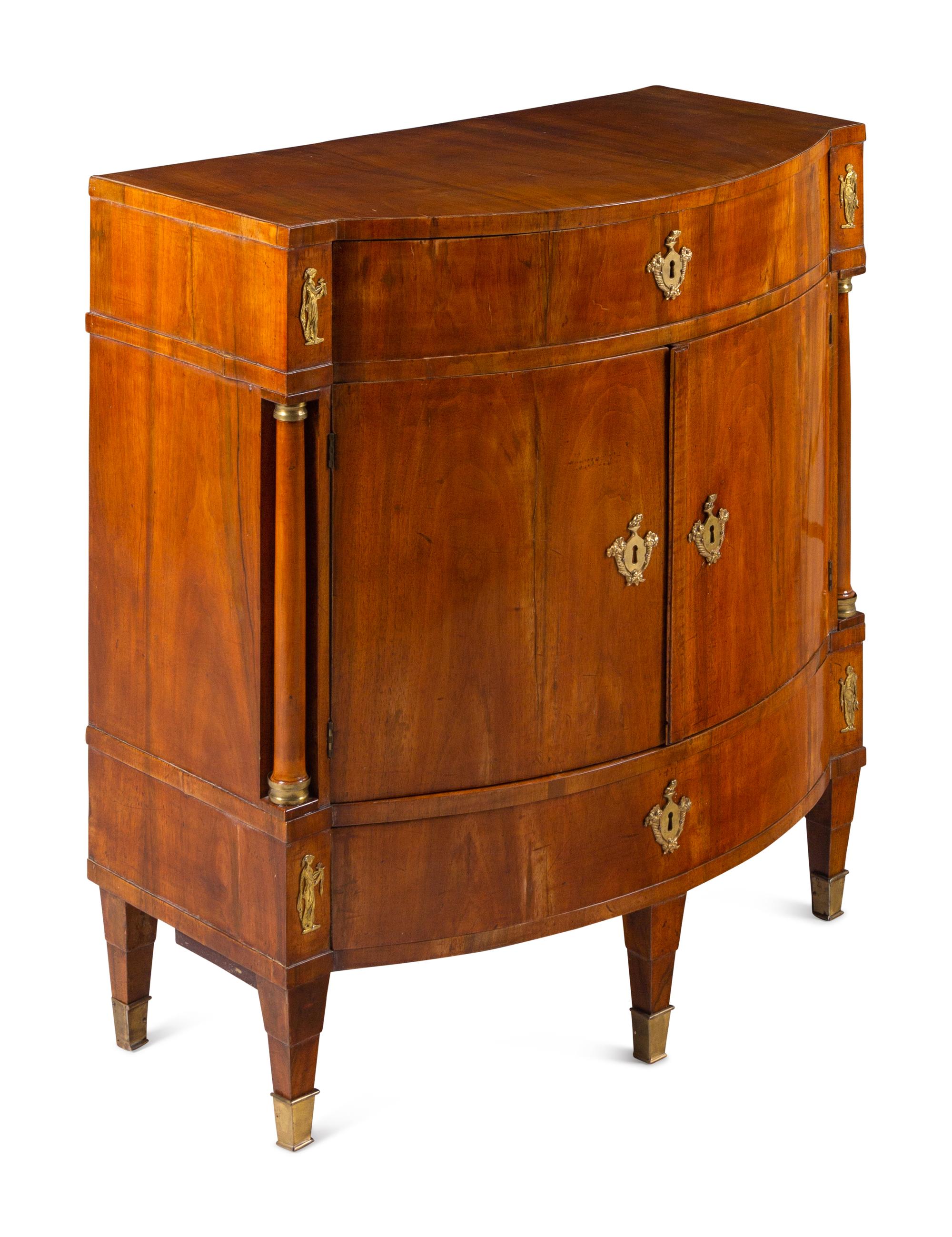 A North European Neoclassical Gilt Metal Mounted Mahogany Cabinet