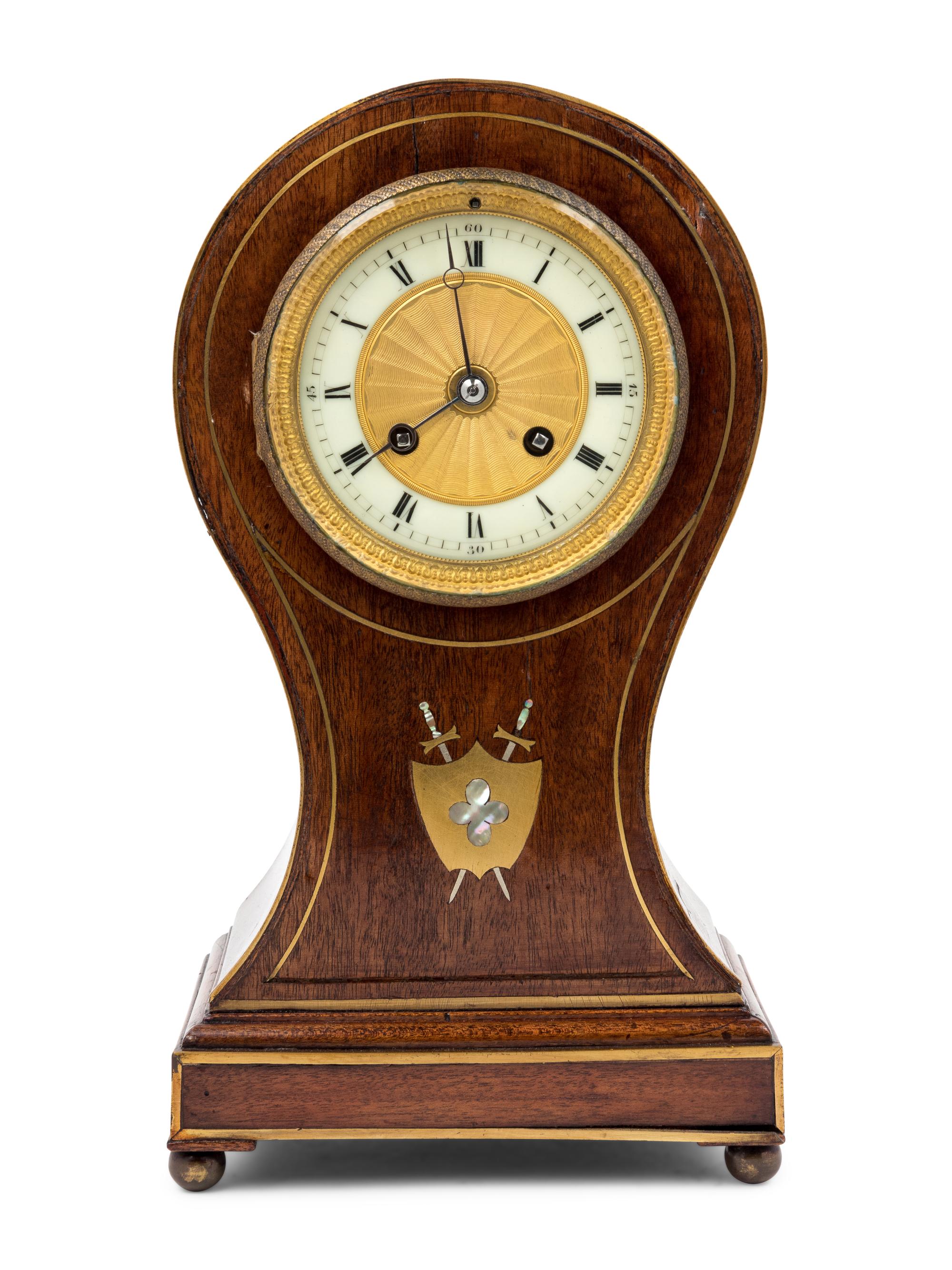 An English Mahogany Balloon Clock