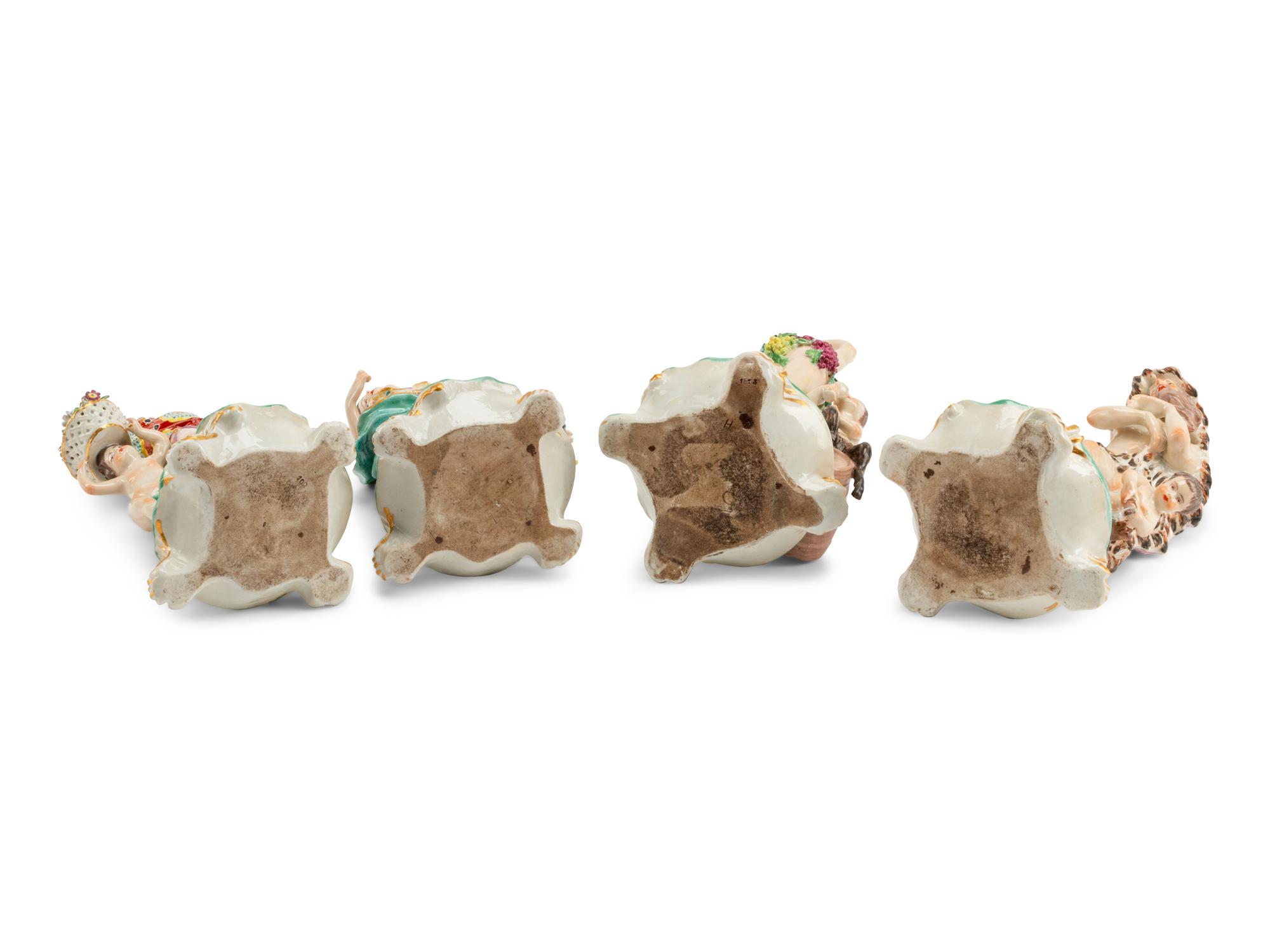 A Set of Four Continental Porcelain Figural Groups Allegorical of the Seasons
