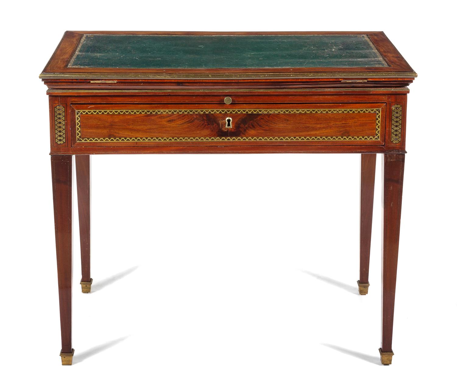 A Directoire Mahogany Drafting Table Height 29 1/2 x width 34 3/8 x depth 20 1/4 inches (closed). — CIRCA 1800