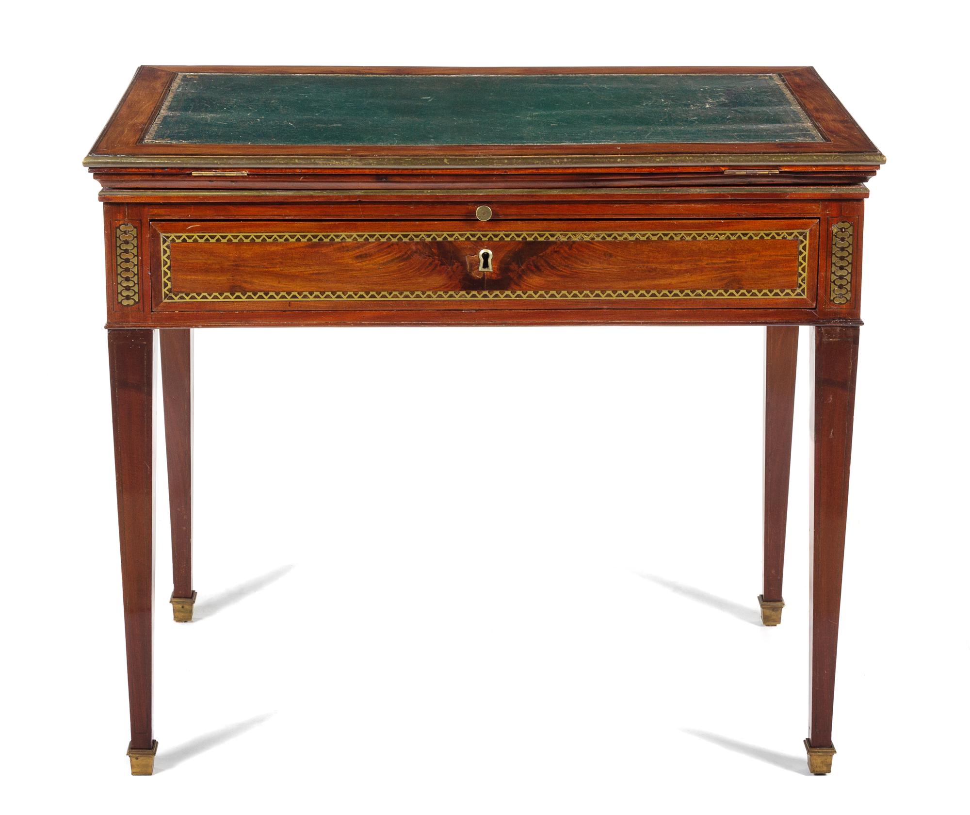 A Directoire Mahogany Drafting Table Height 29 1/2 x width 34 3/8 x depth 20 1/4 inches (closed). — CIRCA 1800