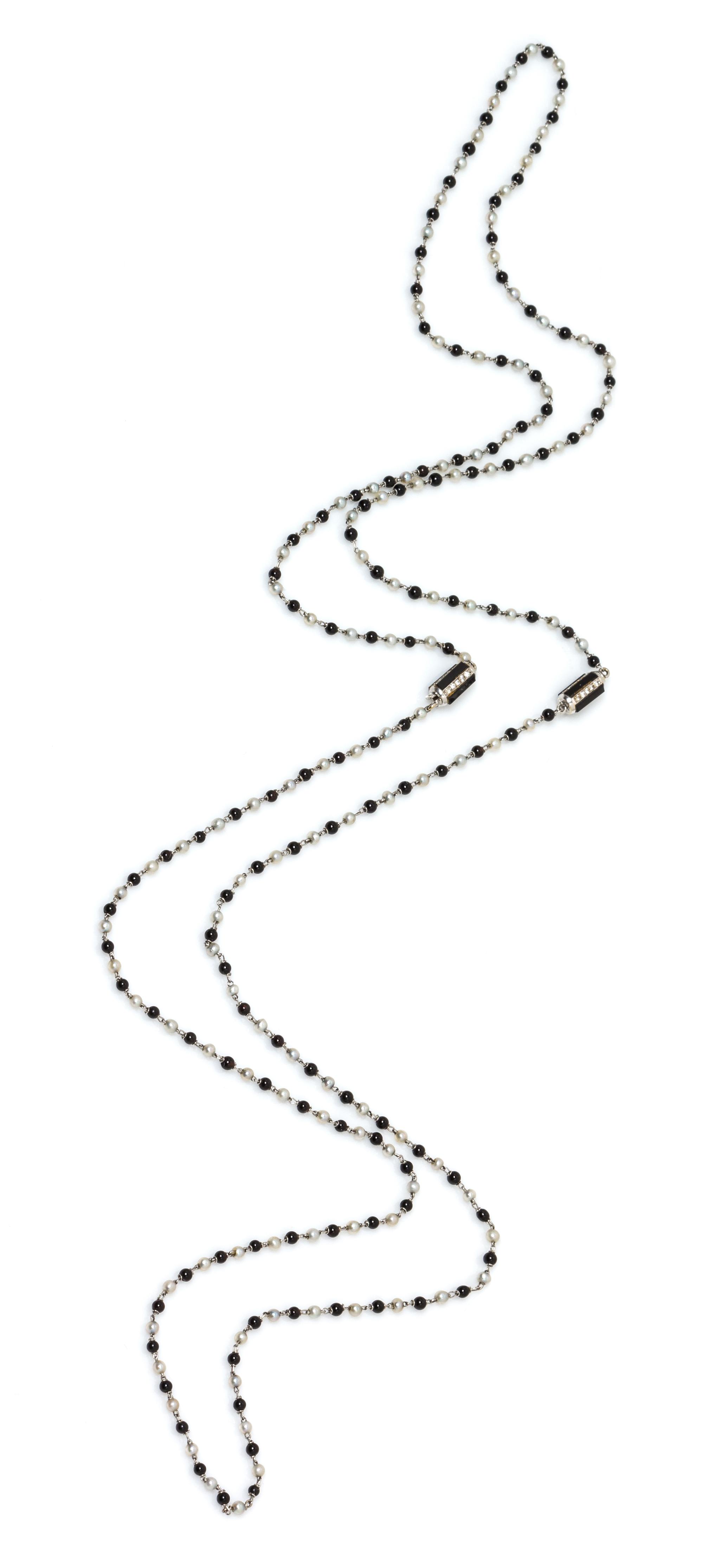 A Pair of 18 Karat White Gold, Onyx, Cultured Seed Pearl and Diamond Station Necklaces, Bvlgari, 8.00 dwts.