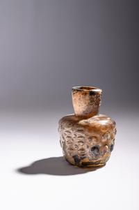 An Islamic Dark Yellow Glass Flask