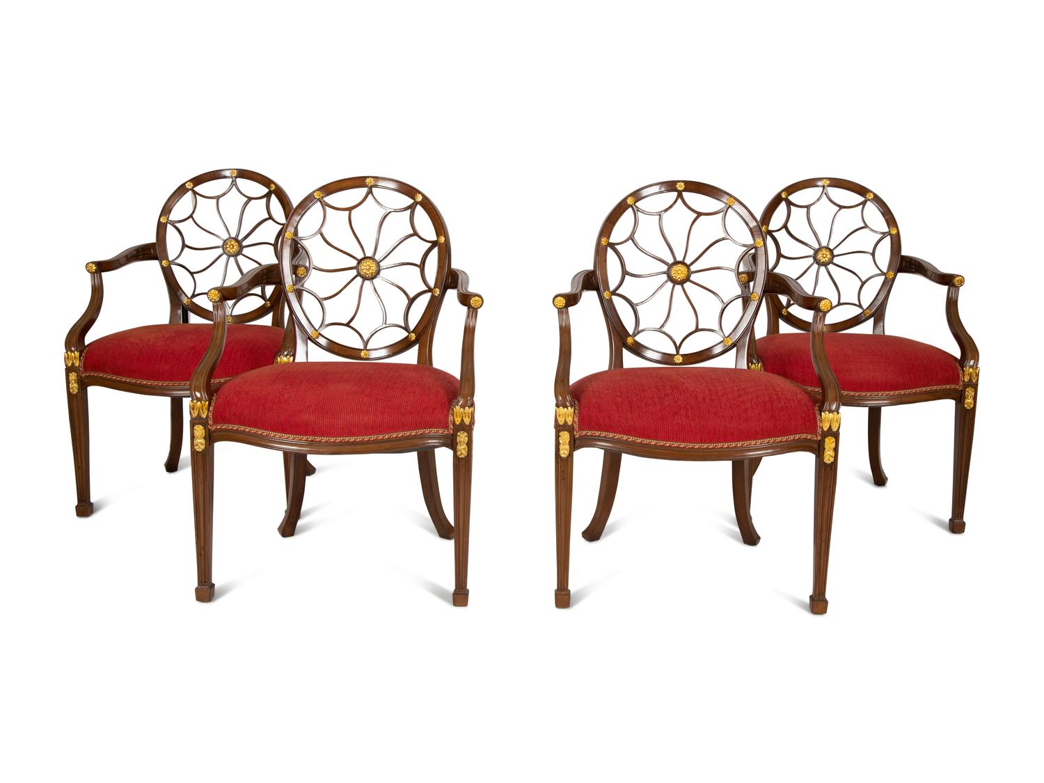 A Set of Eight George III Style Mahogany Wheel Back Armchairs.