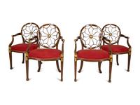 A Set of Eight George III Style Mahogany Wheel Back Armchairs.