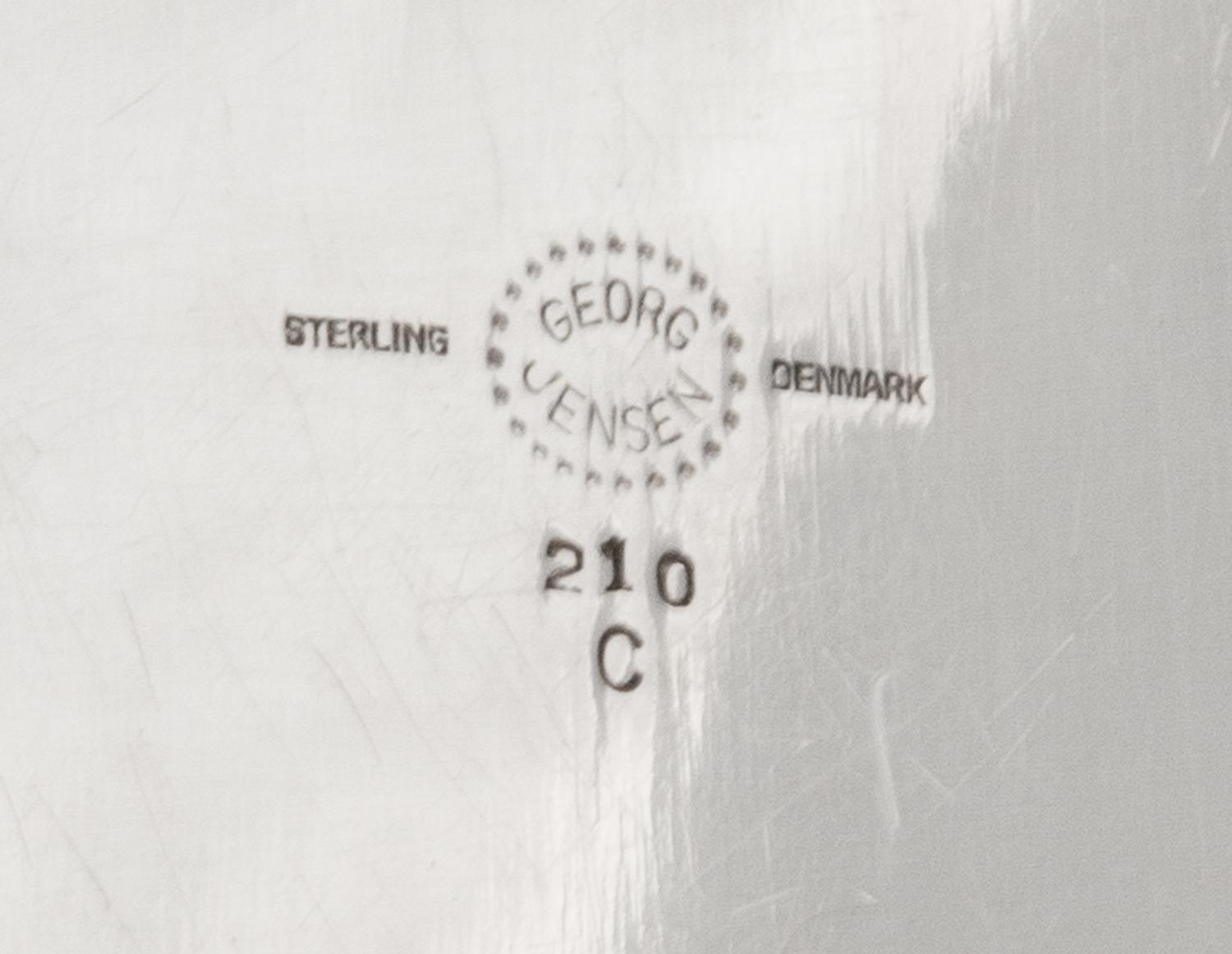 A Danish Silver Tray, Georg Jensen Silversmithy, Copenhagen, Second Half 20th Century, having a spot-hammered finish throughout with a