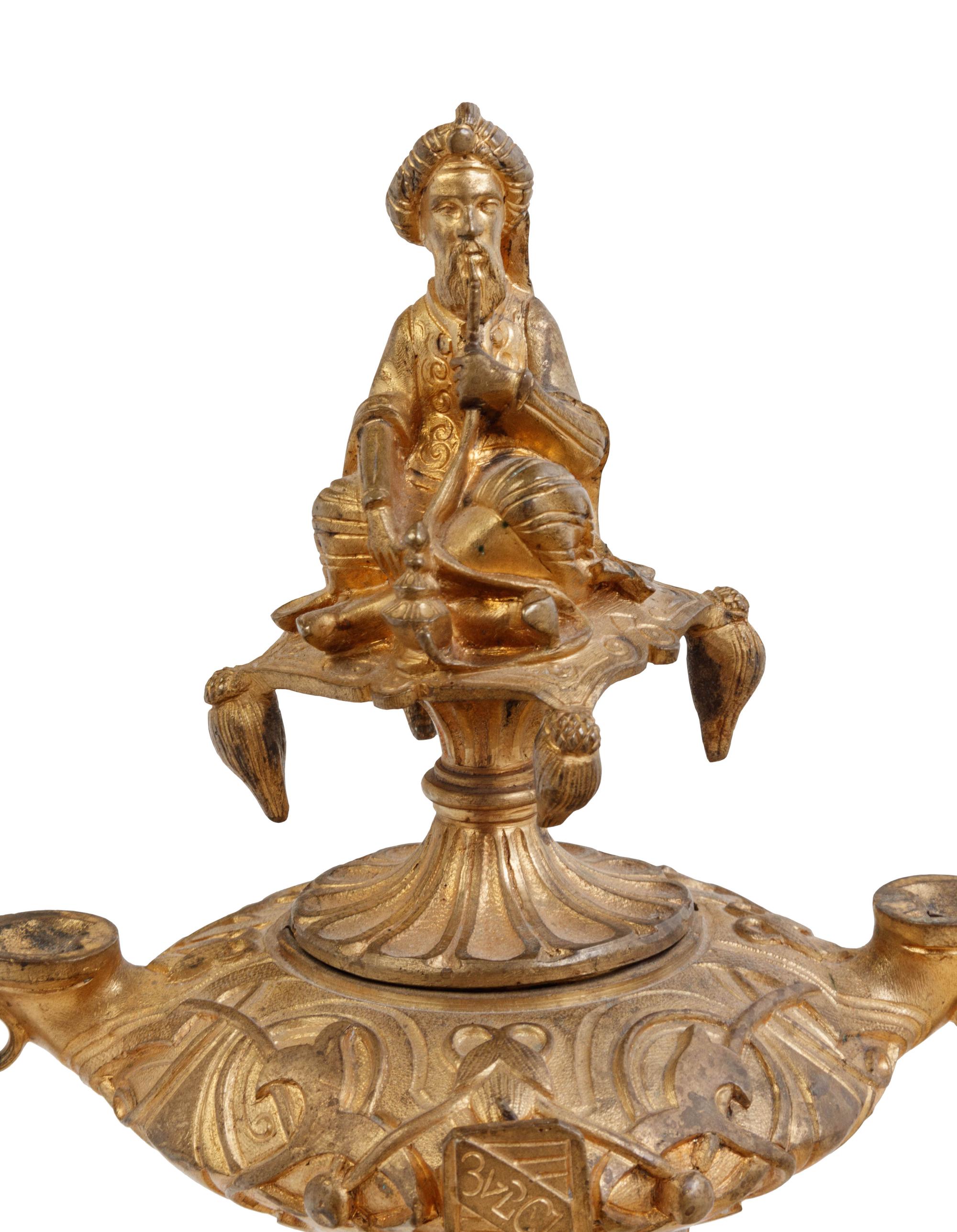 A Continental Gilt Bronze Candelabrum