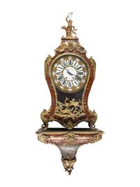 A Louis XV Style Gilt Bronze Mounted Painted Clock and Bracket