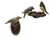 Two carved and painted hanging bird plaques pennsylvania, early 20th century