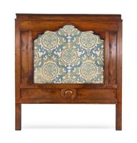 A Continental Walnut Panel Converted to a Headboard