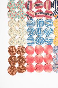 A Pieced Cotton Yo-Yo Quilt