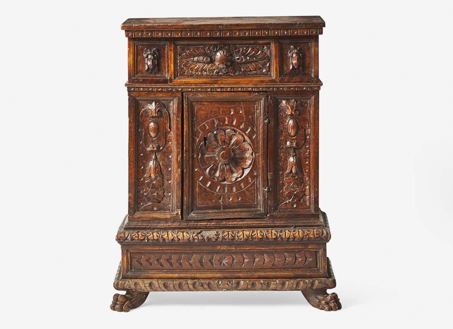An Italian Renaissance carved walnut cabinet, 16th / 17th century