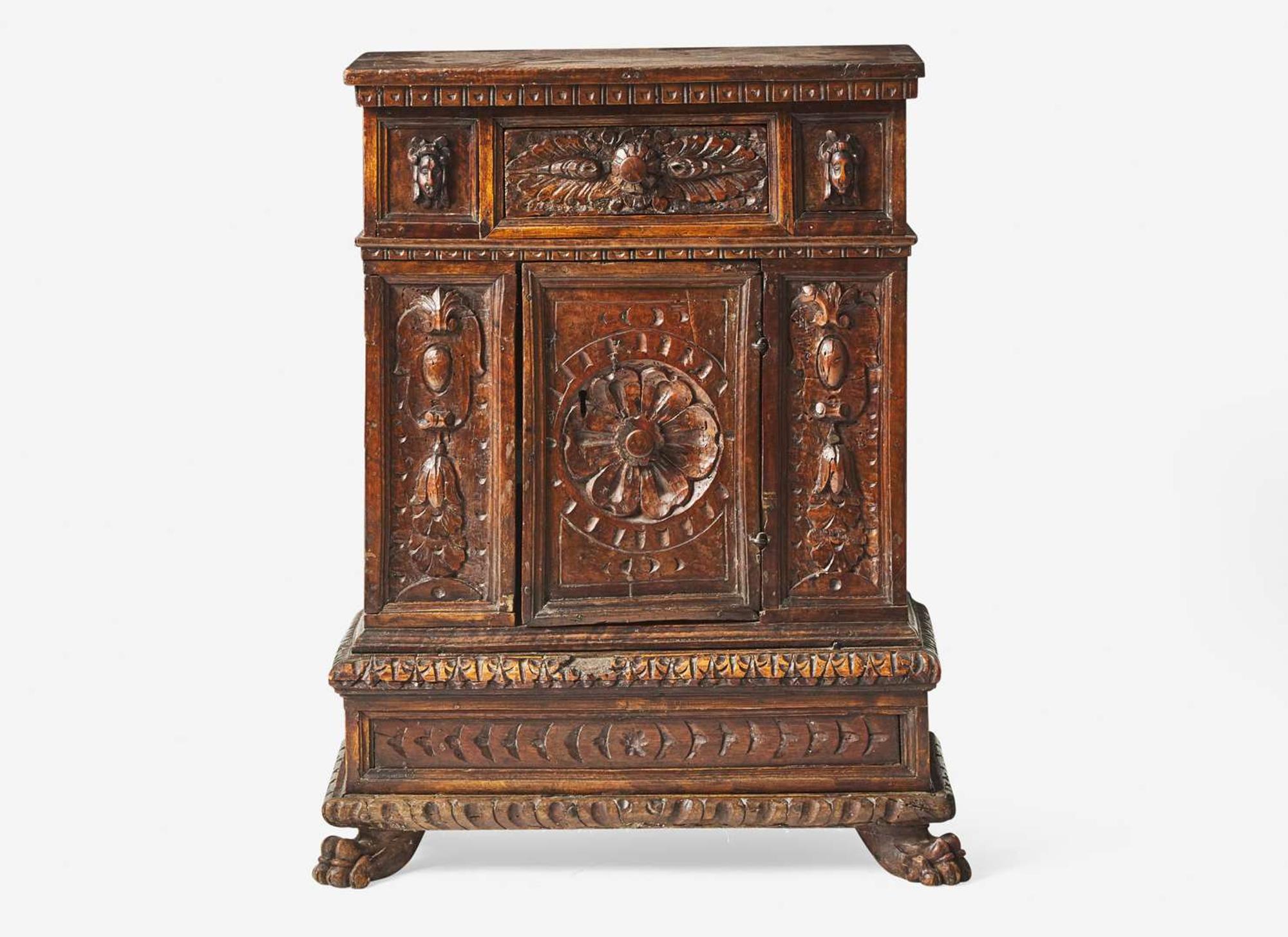 An Italian Renaissance carved walnut cabinet, 16th / 17th century