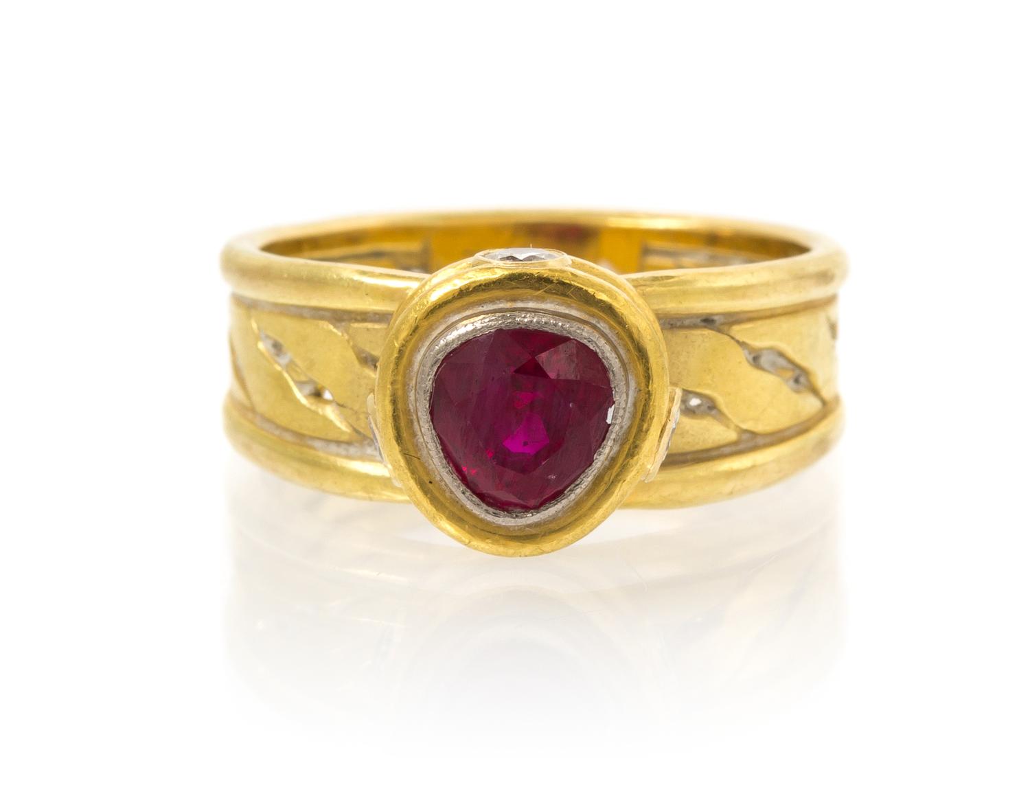 An 18 Karat Yellow Gold, Ruby and Diamond Ring, 5.10 dwts.