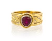 An 18 Karat Yellow Gold, Ruby and Diamond Ring, 5.10 dwts.