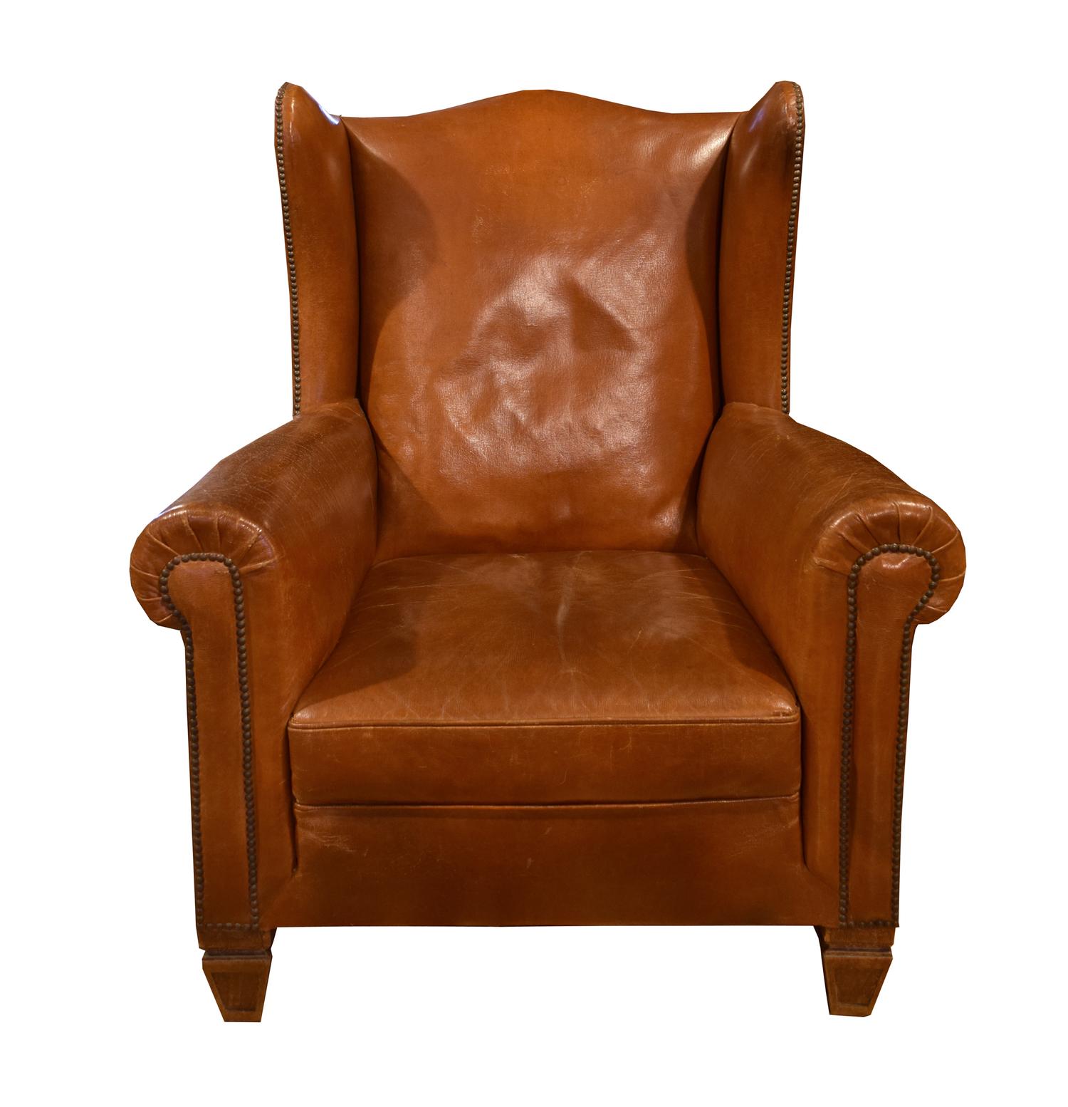 A Leather Upholstered Wingback Chair 34.5" W x 30" D x 41" H — Italy, Circa 1910