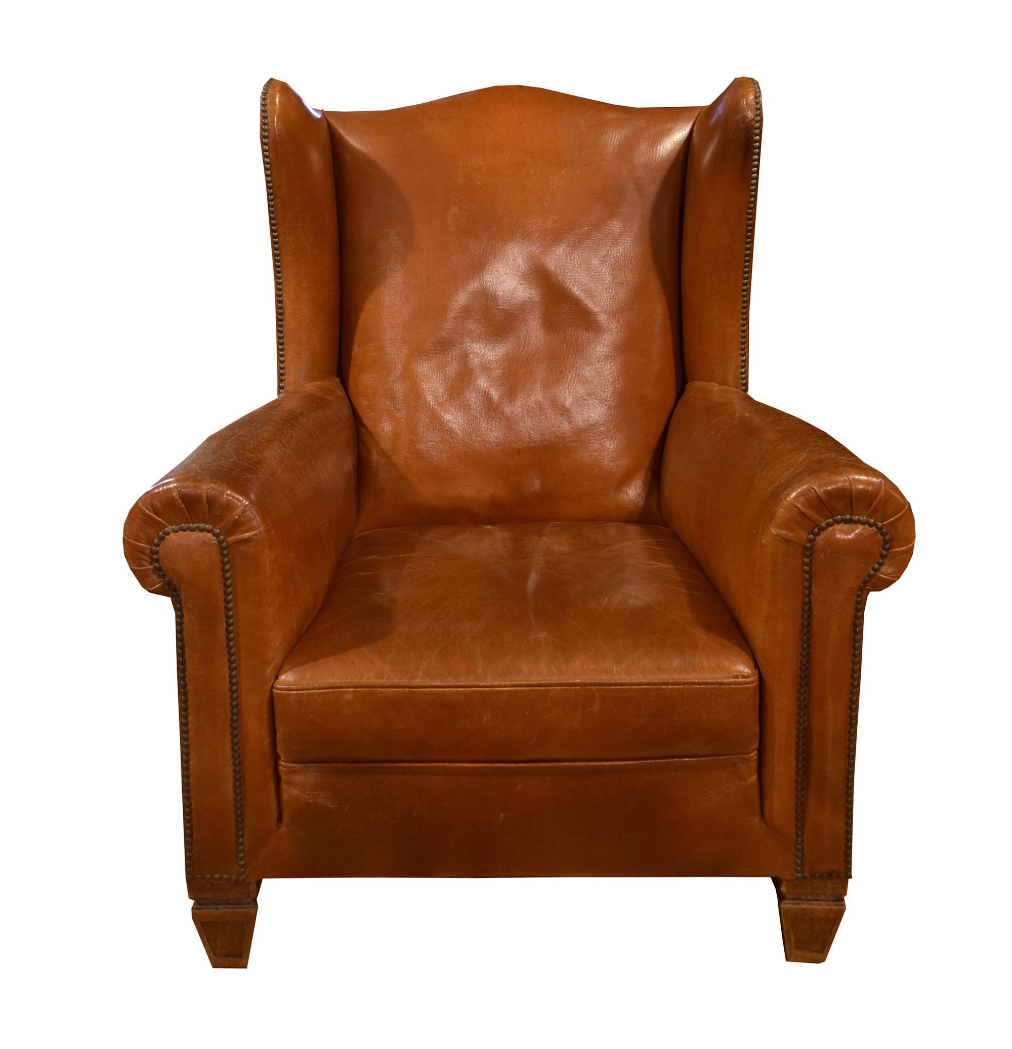 A Leather Upholstered Wingback Chair 34.5" W x 30" D x 41" H — Italy, Circa 1910