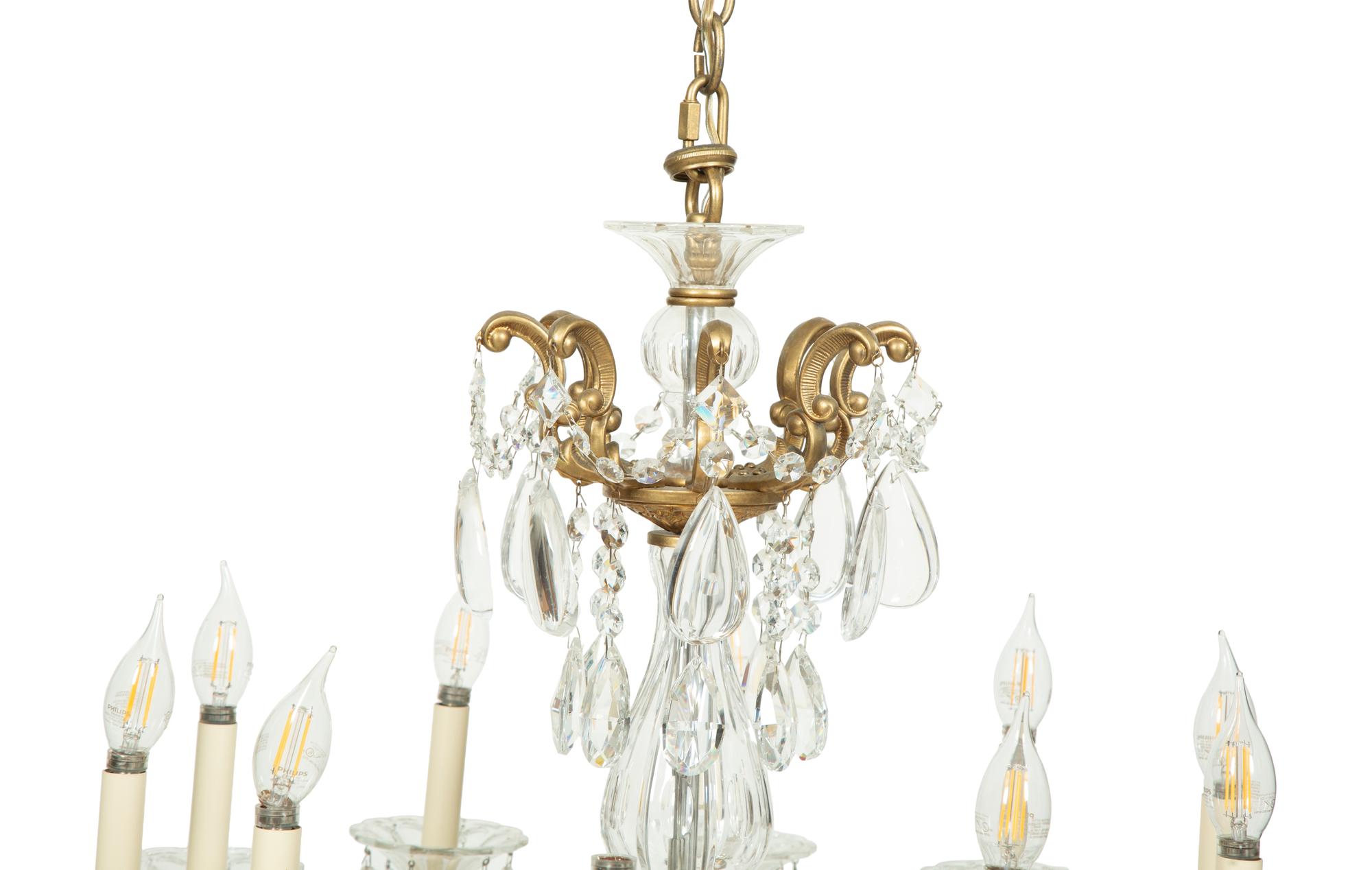 An Empire Style Gilt Metal and Glass Ten-Light Chandelier