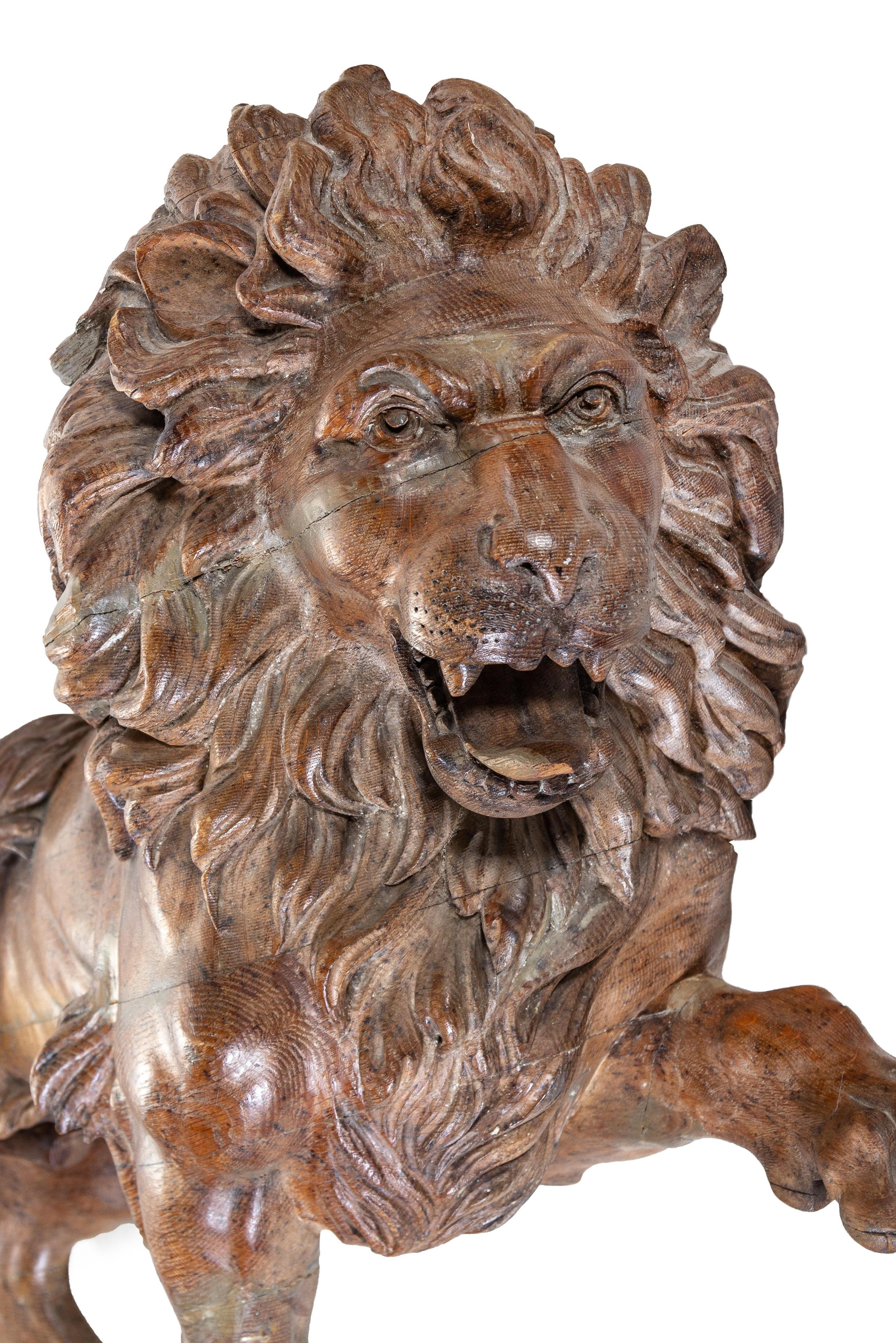 A Pair of English Limed Oak Models of Lions