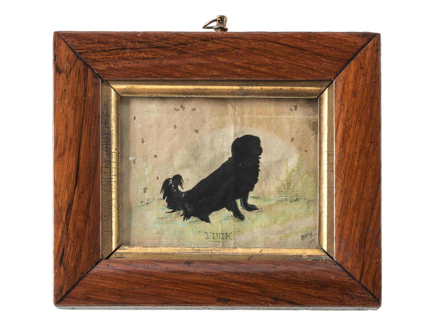 A Cut Paper Silhouette of a Dog