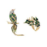 COLLECTION OF DIAMOND AND POLYCHROME ENAMEL BROOCHES