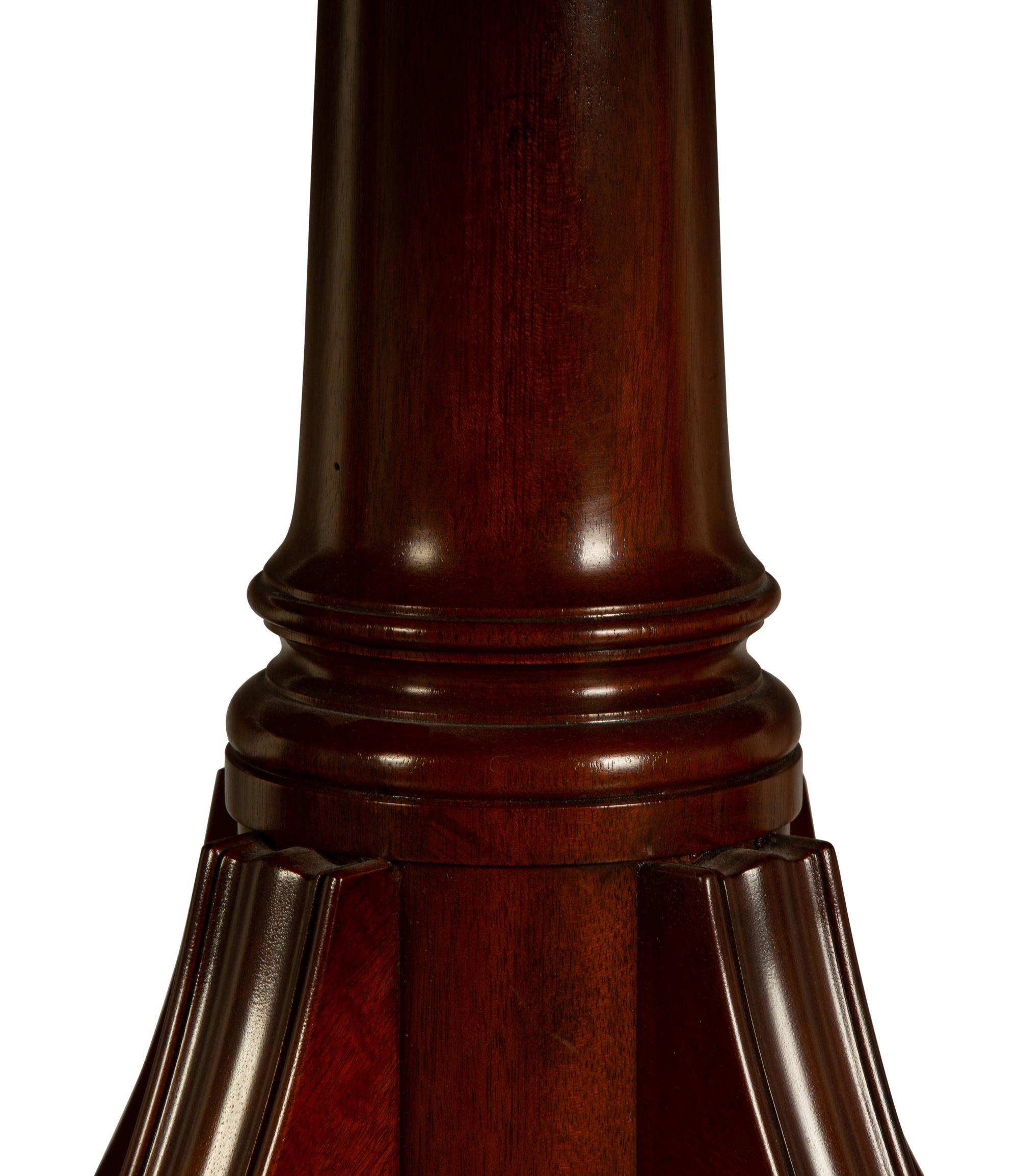 A Regency Style Mahogany Triple Pedestal Dining Table — 20TH CENTURY