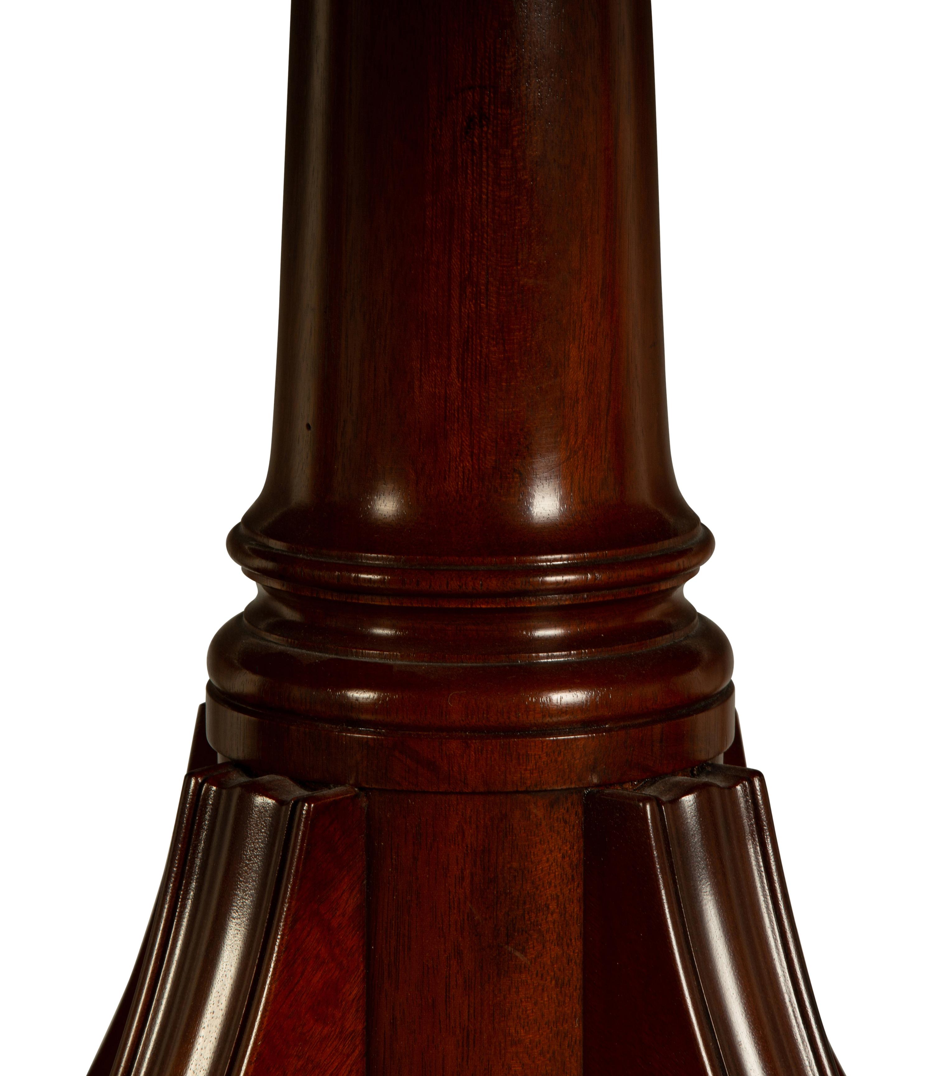 A Regency Style Mahogany Triple Pedestal Dining Table — 20TH CENTURY