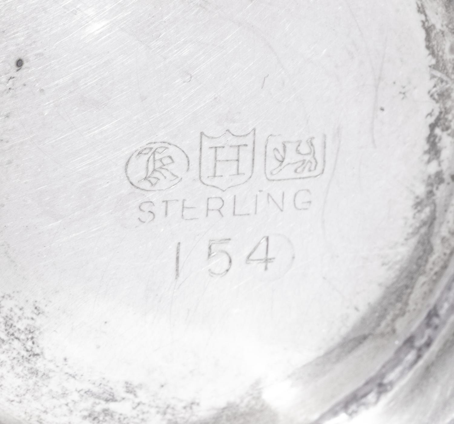 A Pair of English Silver Sauce Boats and an American Silver Sugar and Creamer Set