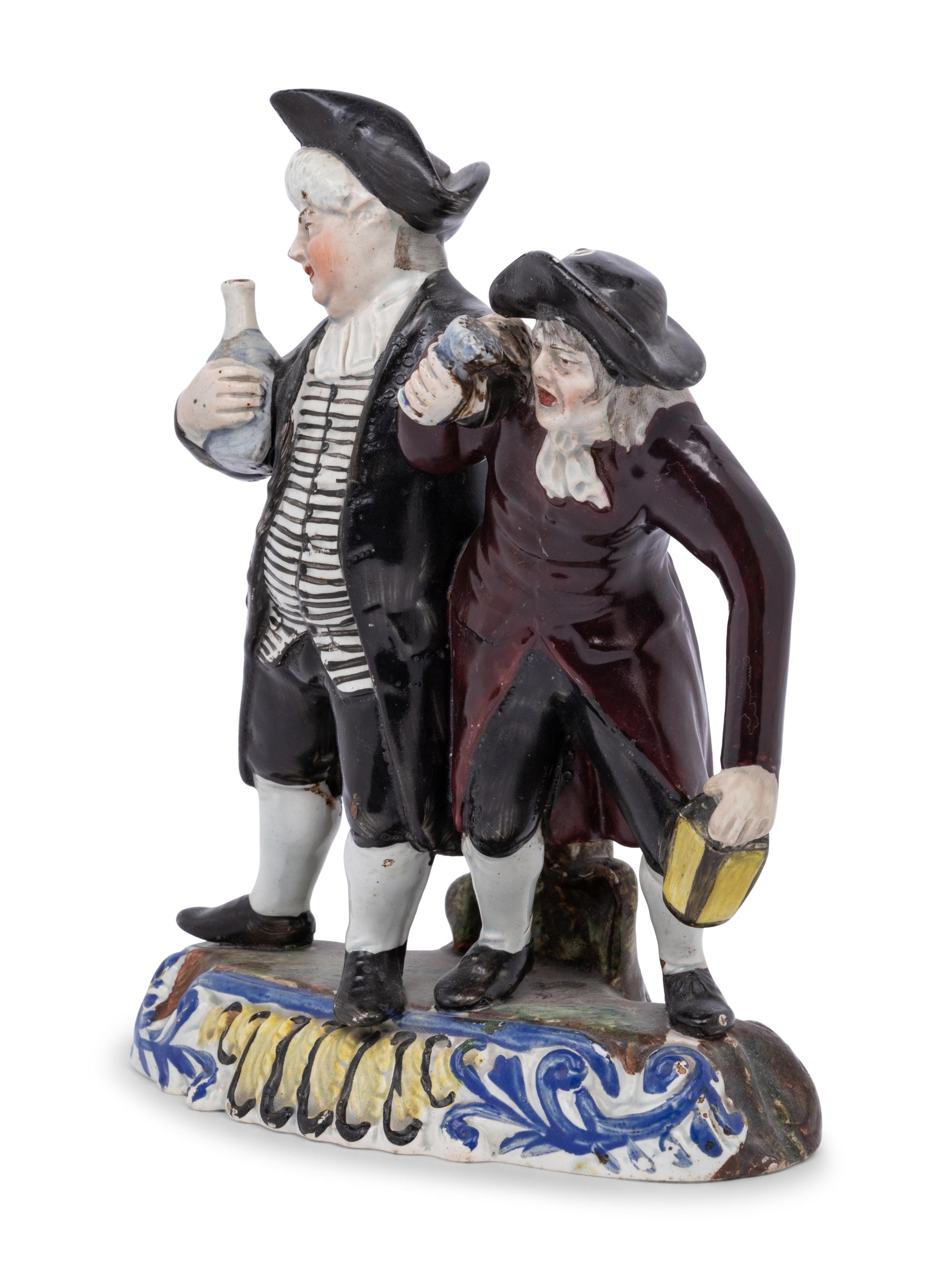 A Victorian Glazed Earthenware Figural Group
