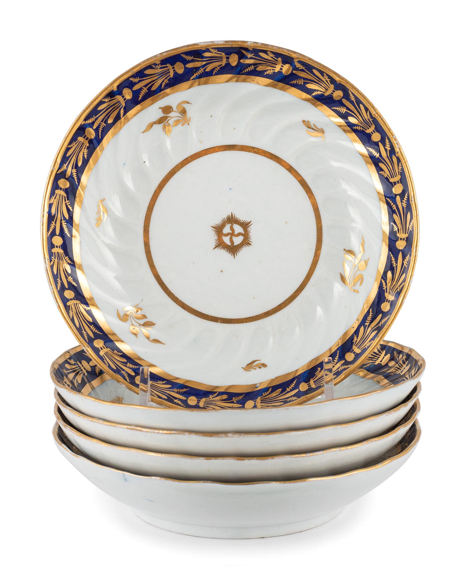 An English Gilt and Cobalt Decorated Porcelain Tea Service