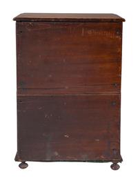 A Miniature Cherry Four-Drawer Chest