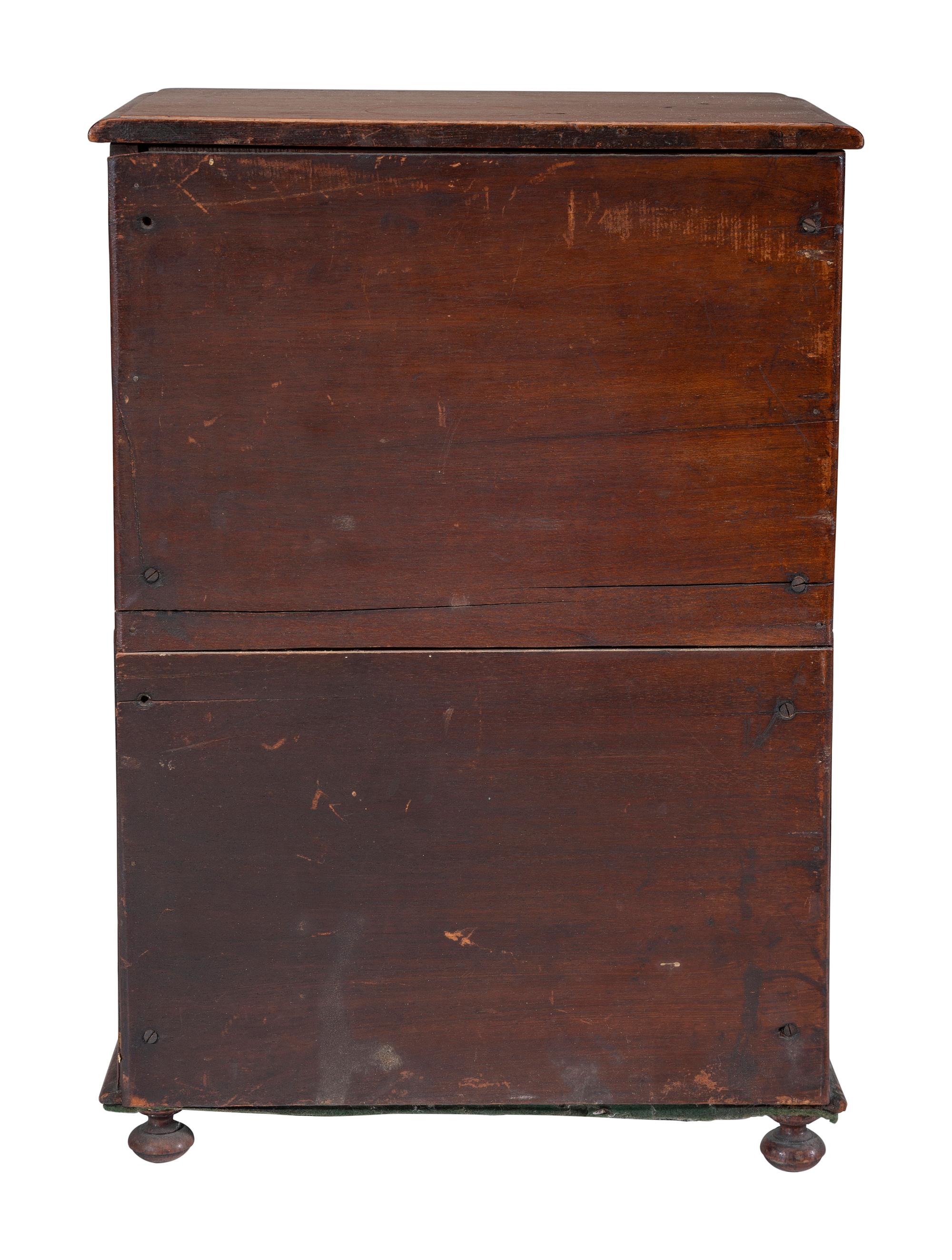 A Miniature Cherry Four-Drawer Chest