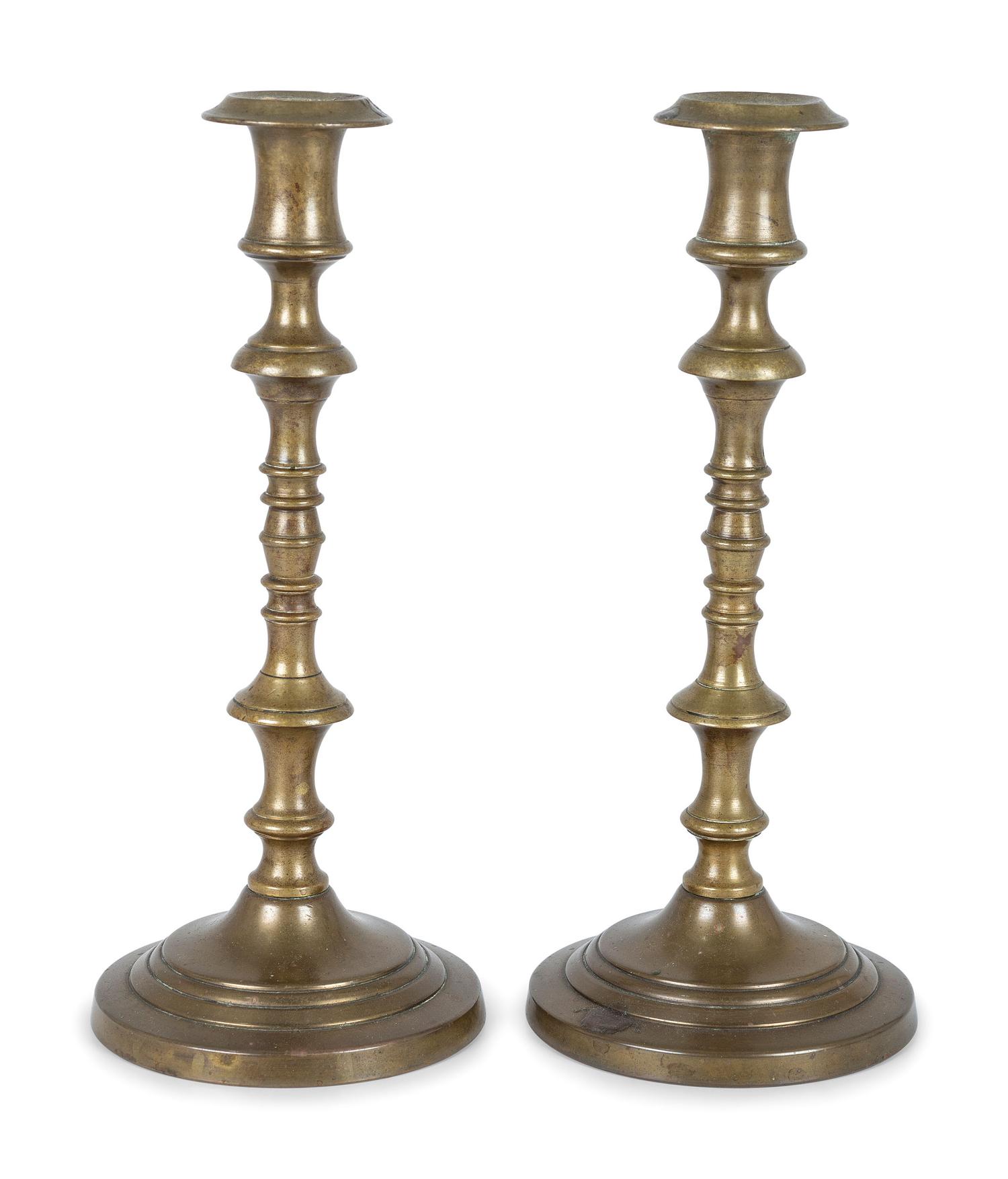 Three Pairs of English Brass Candlesticks