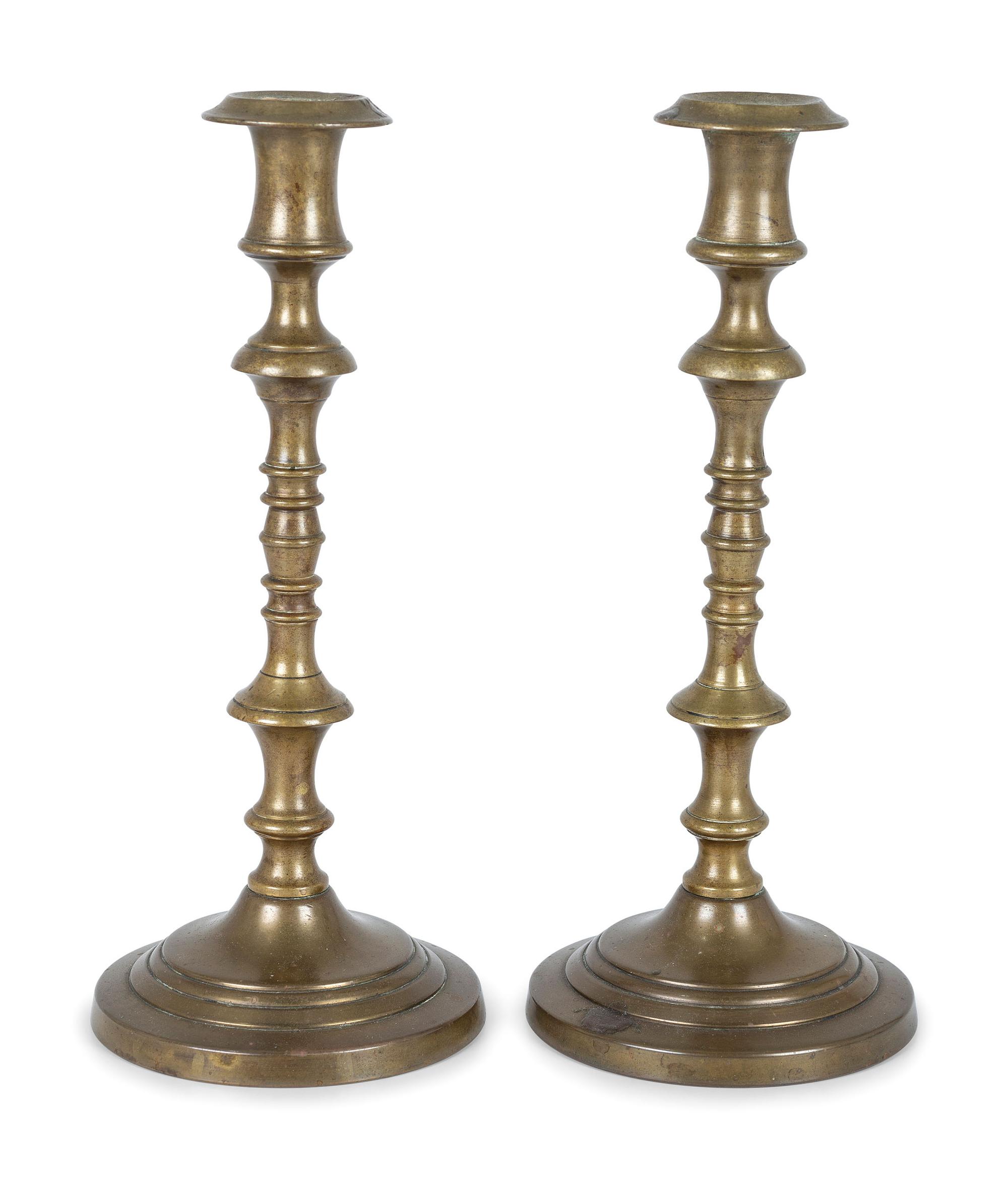 Three Pairs of English Brass Candlesticks