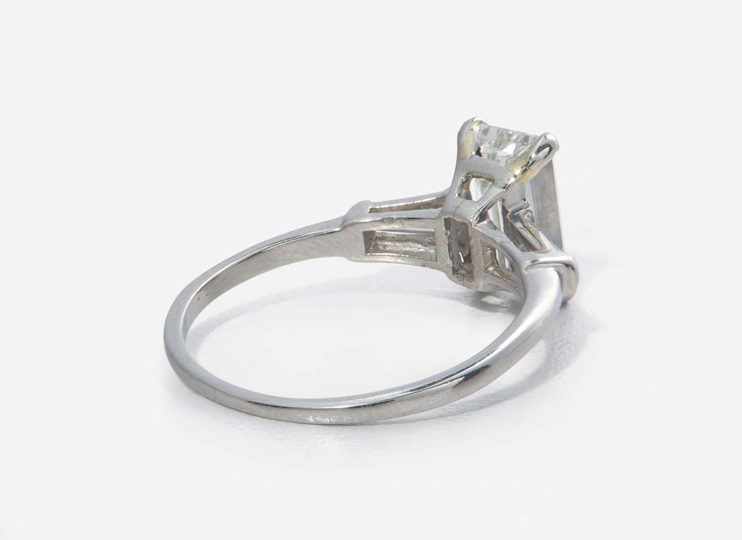 A Platinum and Diamond Ring with Ring Guards, 1.61 Carat Emerald-Cut Diamond, GIA Certified
