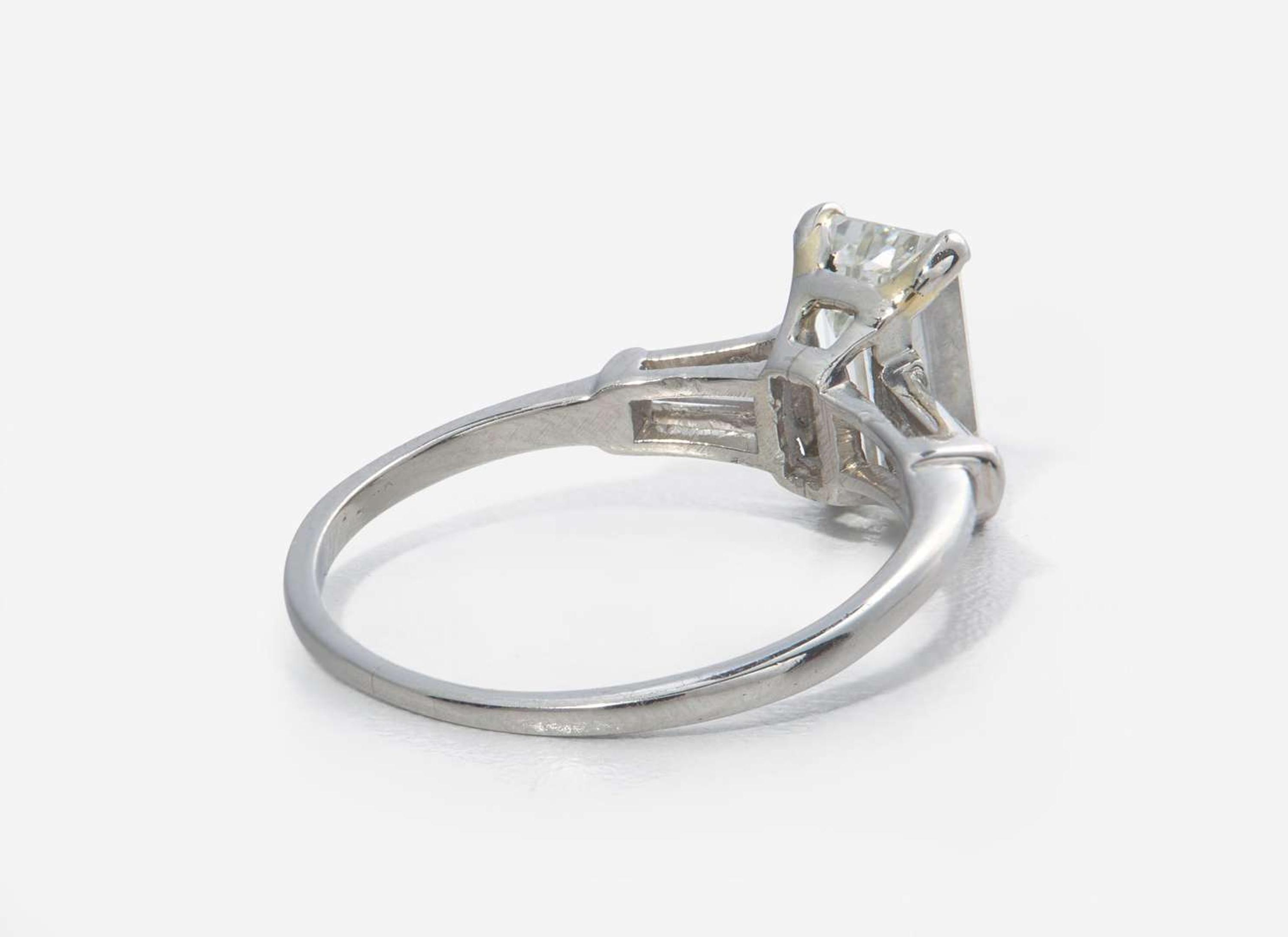A Platinum and Diamond Ring with Ring Guards, 1.61 Carat Emerald-Cut Diamond, GIA Certified
