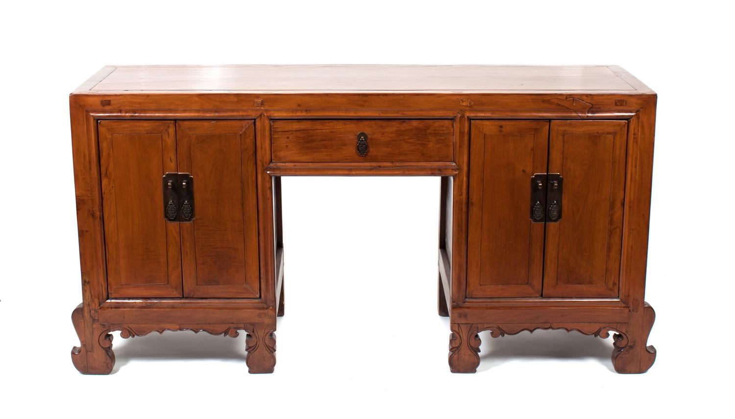 A Chinese Walnut Two Pedestal Desk Height 34 x width 63 3/4 x depth 20 inches. — 20TH CENTURY