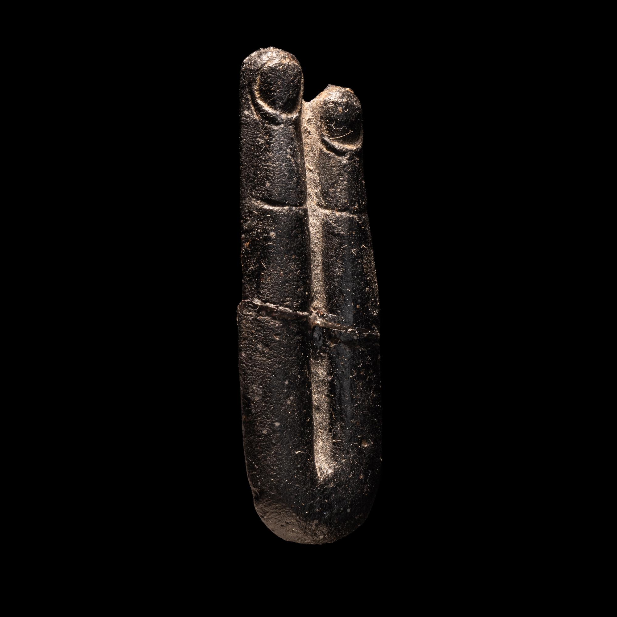 An Egyptian Stone Two-Finger Amulet
