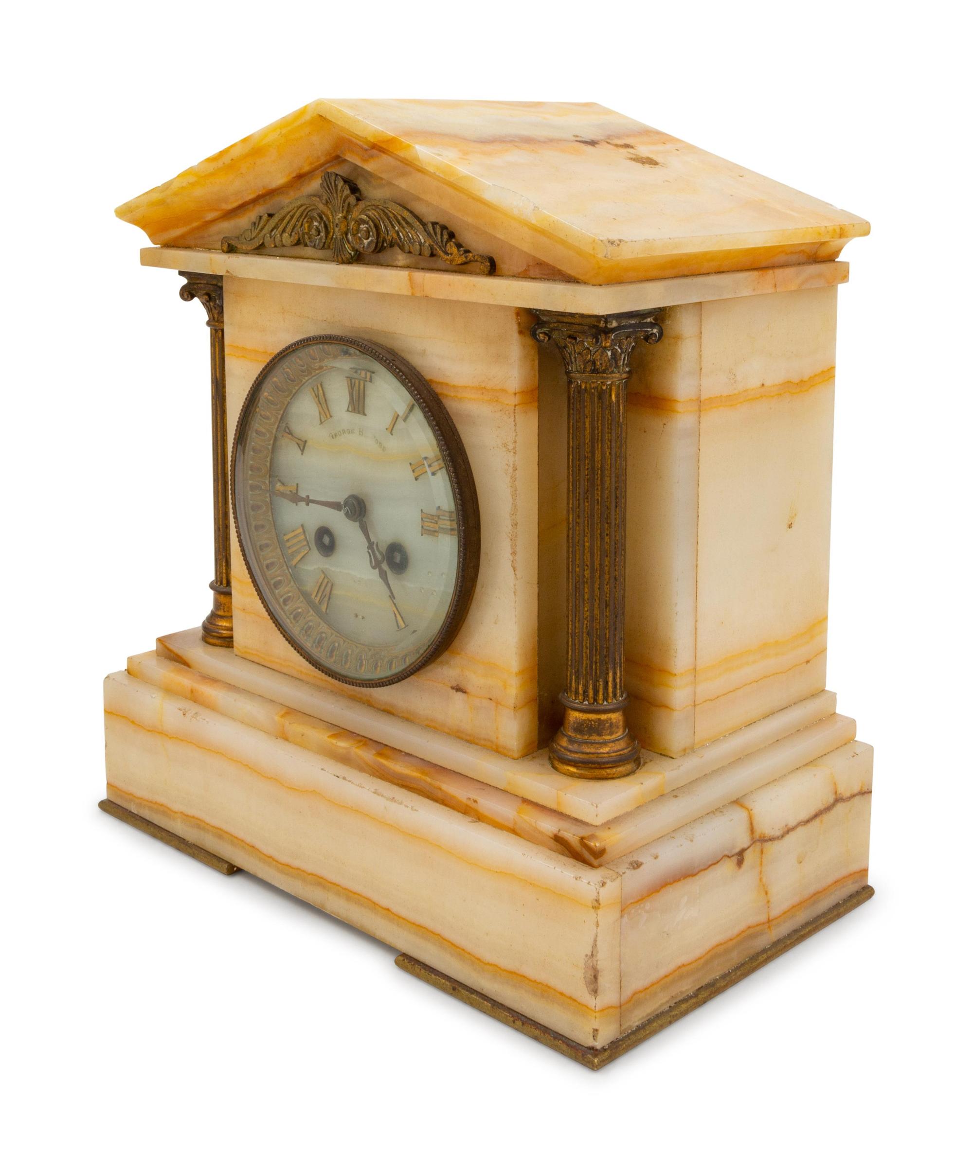 A Gilt-Metal Mounted Onyx Mantel Clock