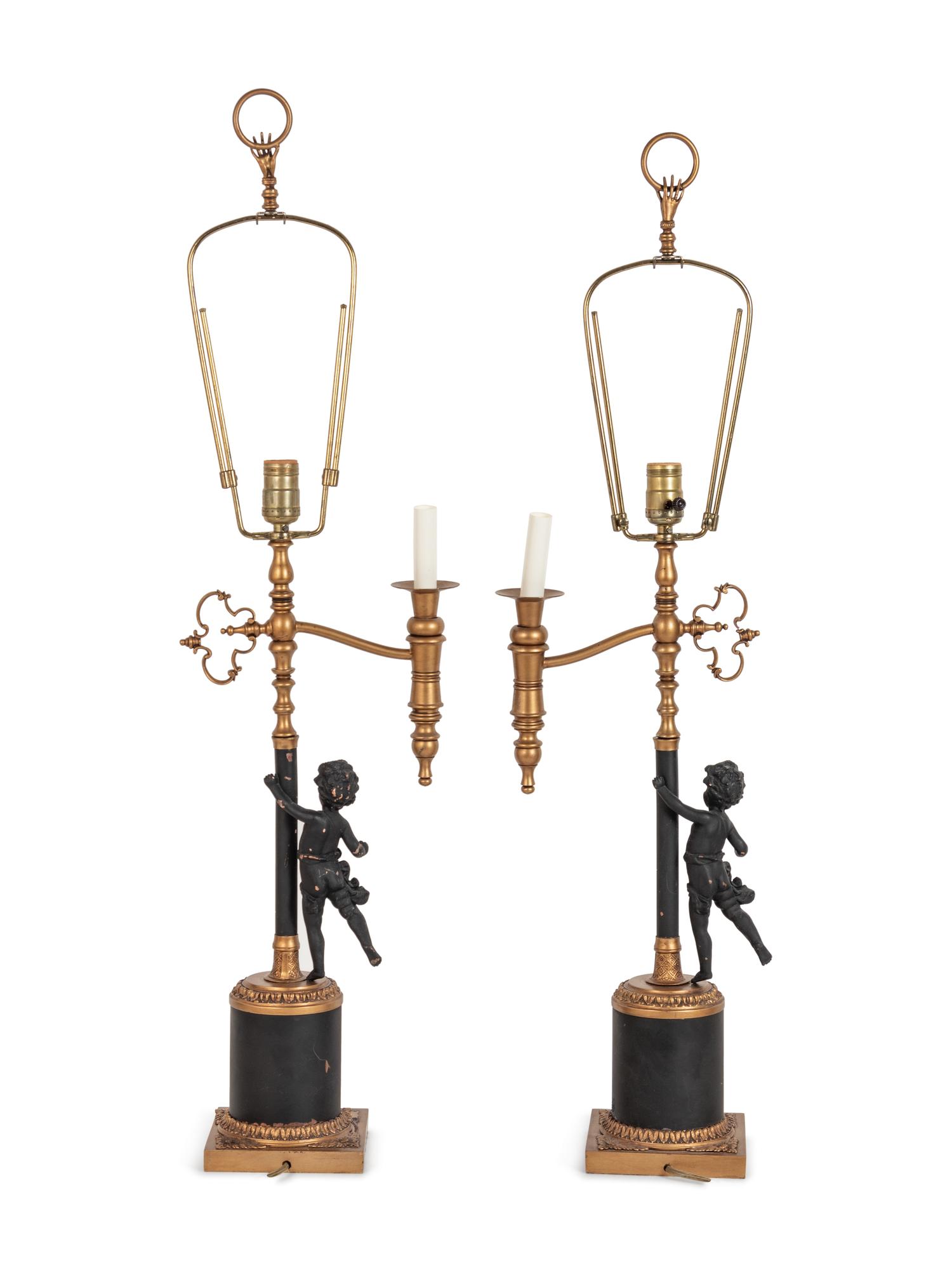 A Pair of Continental Gilt and Patinated Cast Metal Single-Light Candelabra Mounted as Lamps