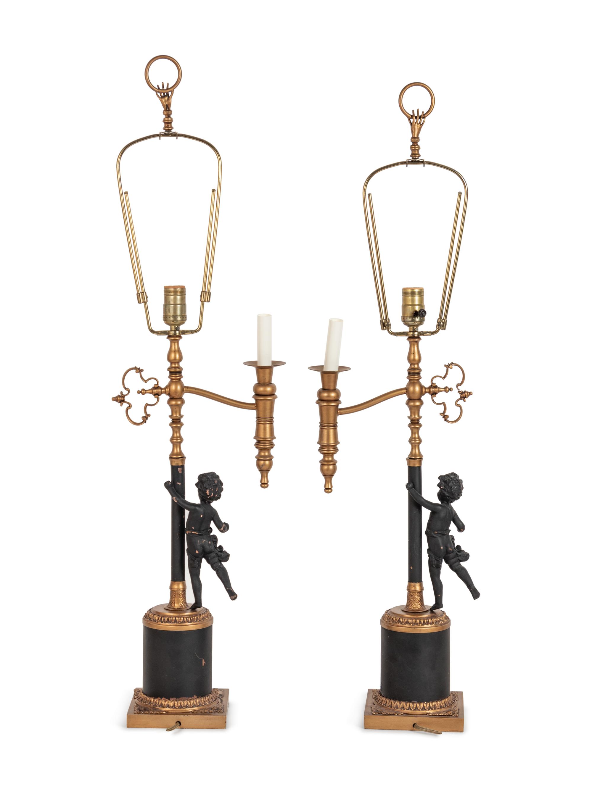 A Pair of Continental Gilt and Patinated Cast Metal Single-Light Candelabra Mounted as Lamps